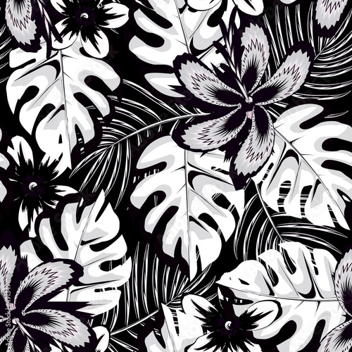 exotic vintage tropical monstera plants seamless pattern with palm leaf and abstract hibiscus flower in black white color on night background. fashionable texture. Summer print design. decorative