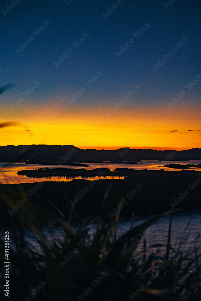 Sunset at the beach in Tauranga in New Zealand, Sunset at the beach in Tauranga in New Zealand,