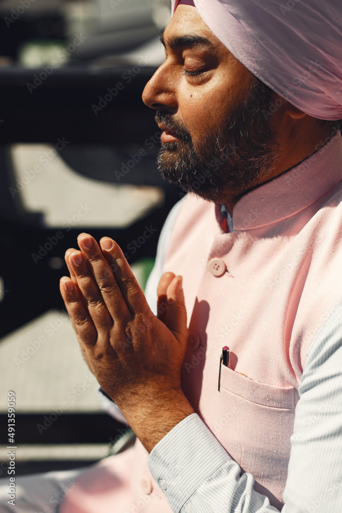 Fototapeta premium Portrait of Indian sikh man in turban with bushy beard