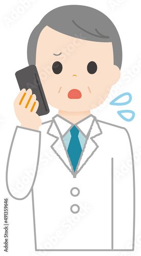 電話する白衣の男性