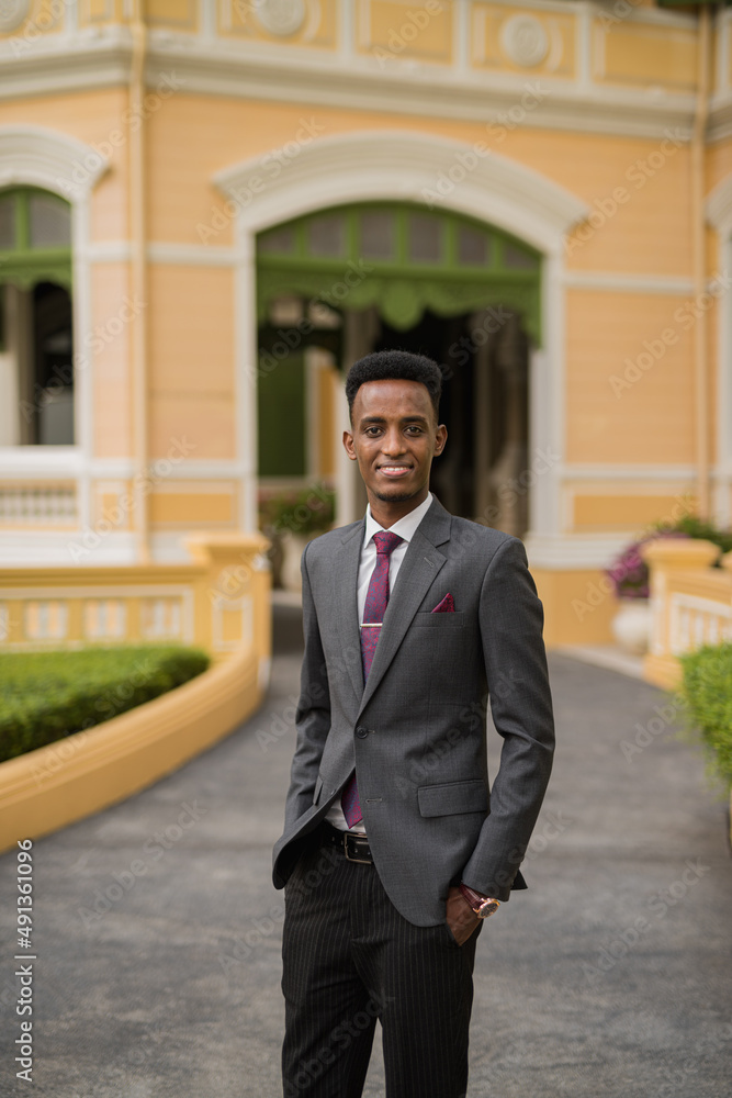 Portrait of handsome young African businessman outdoors Portrait of handsome young African businessman outdoors