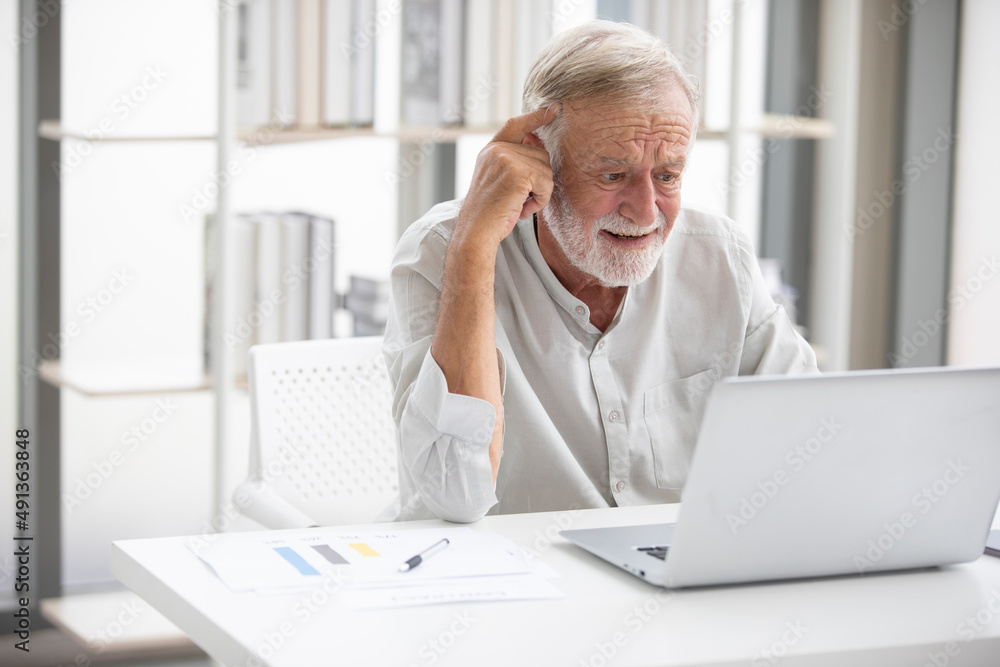 senior businessman with laptop computer and thinking something senior businessman with laptop computer and thinking something