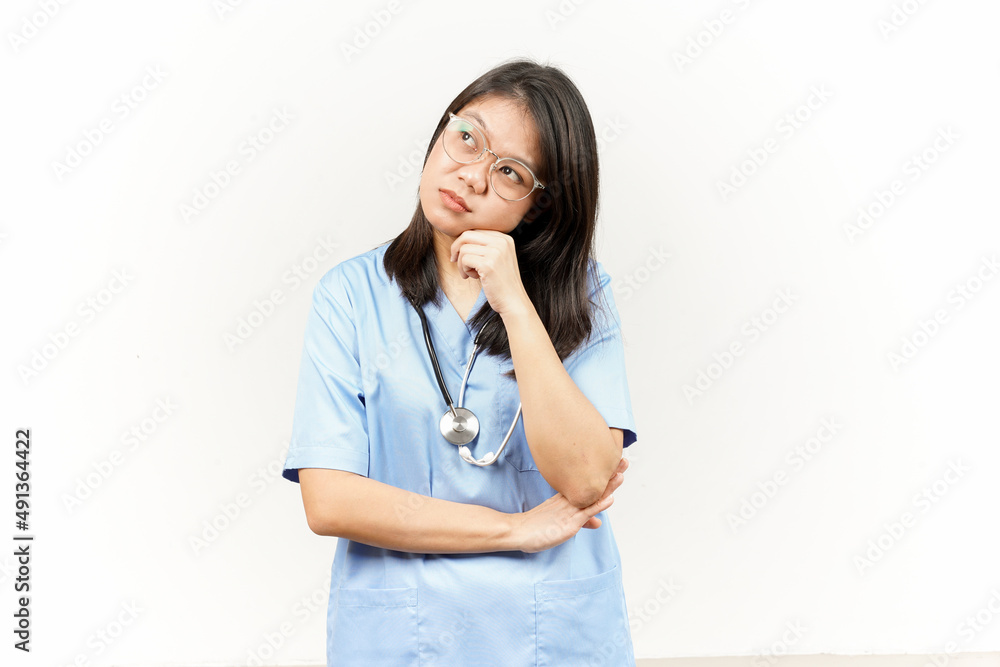 Thinking and Curious Of Asian Young Doctor Isolated On White Background Thinking and Curious Of Asian Young Doctor Isolated On White Background