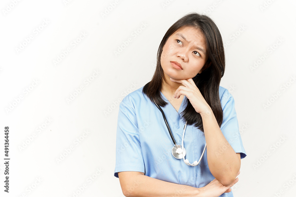 Thinking and Curious Of Asian Young Doctor Isolated On White Background Thinking and Curious Of Asian Young Doctor Isolated On White Background