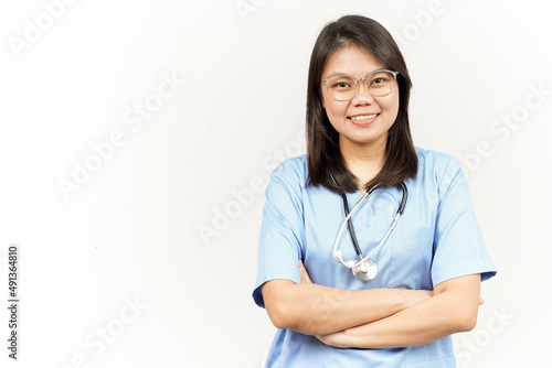 Smiling and Folding arms Of Asian Young Doctor Isolated On White Background © Sino Images Studio