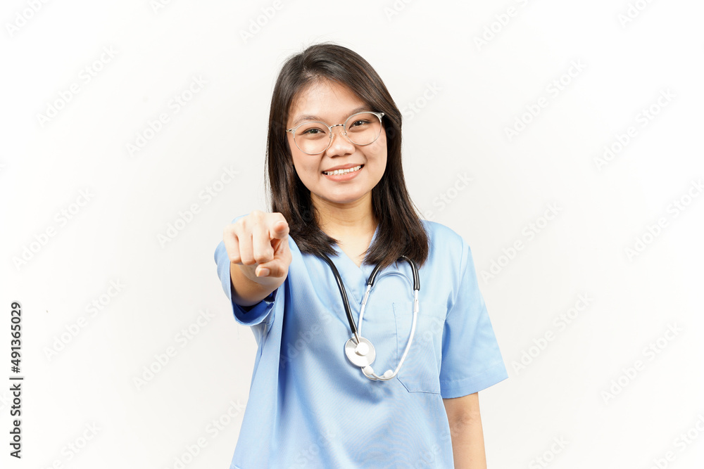 Smiling and Pointing at You, Want You Gesture Of Asian Young Doctor Isolated On White Background Smiling and Pointing at You, Want You Gesture Of Asian Young Doctor Isolated On White Background