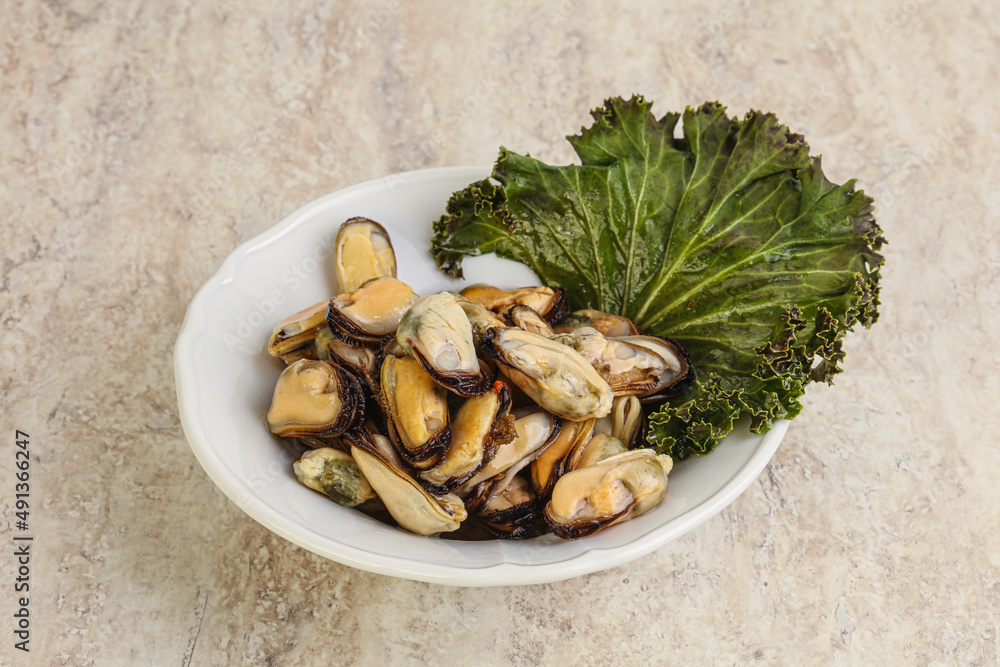 Tasty marinated mussels in the bowl Tasty marinated mussels in the bowl