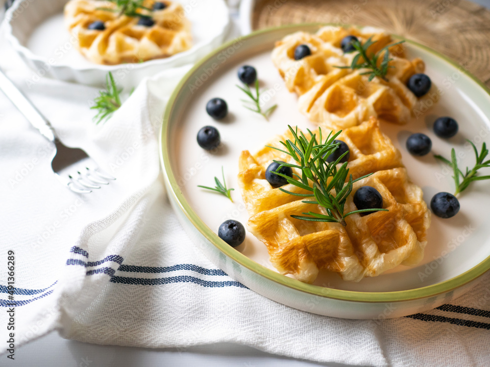 Delicious homemade waffle toping with blueberries