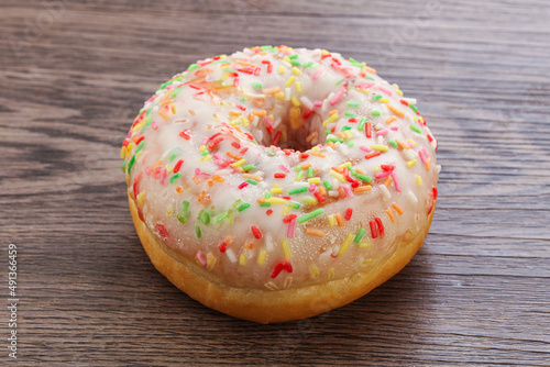 Sweet glazed vanilla donut with icing