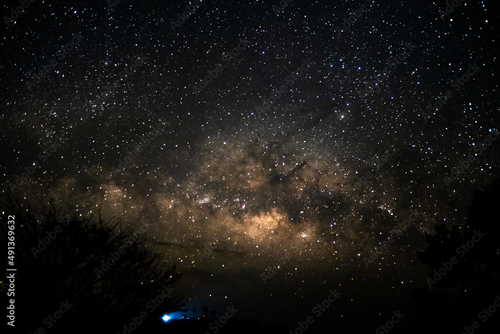 View universe space shot of milky way galaxy with stars on a night sky ...