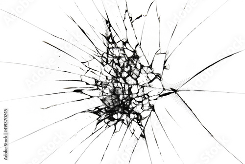 Broken glass. A split in a transparent window. Glass cracks on a white background texture