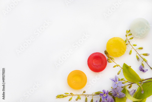 cough sore throat pastille colorful extract from herbal with flower arrangement flat lay style on background white 