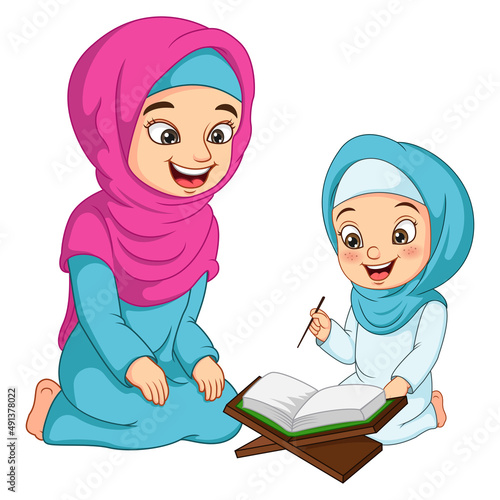 Muslim woman teaching his daughter read Quran