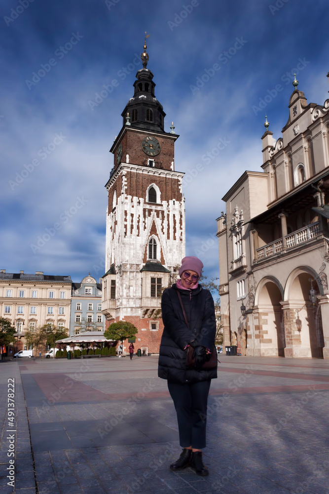 A mature woman on the Main Square of Krakow