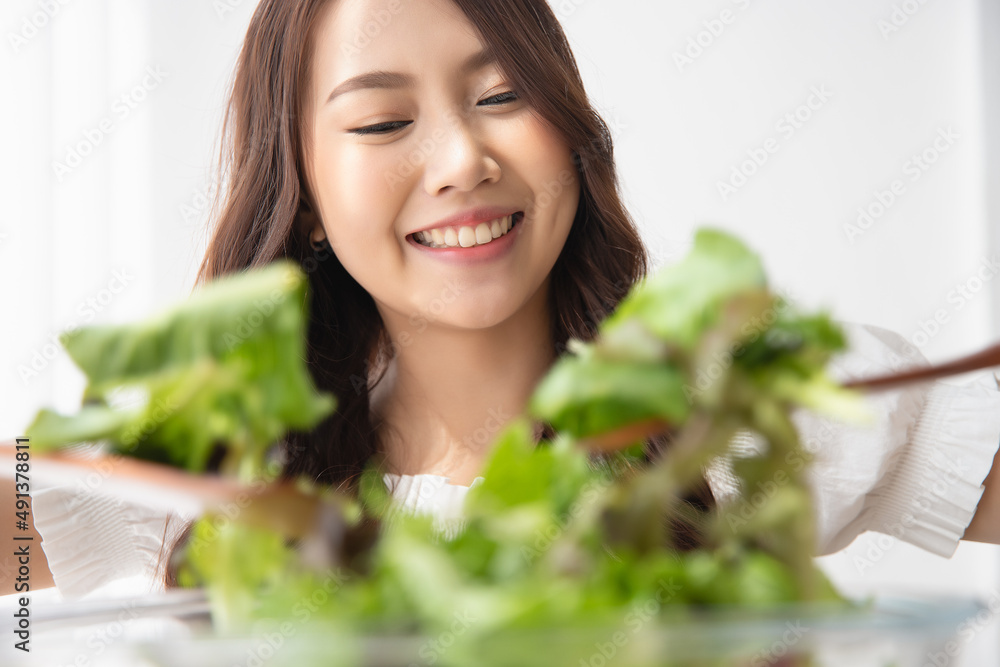 Healthy lifestyle, Close up beautiful young asian woman cooking salad smiling happy. Healthy eating, Food and lifestyle, Health, Beauty, Dieting concept. Healthy lifestyle, Close up beautiful young asian woman cooking salad smiling happy. Healthy eating, Food and lifestyle, Health, Beauty, Dieting concept.