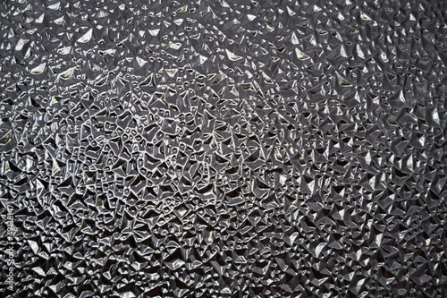 water drops on a glass, glass in the form of water droplets illuminated by sunlight, background