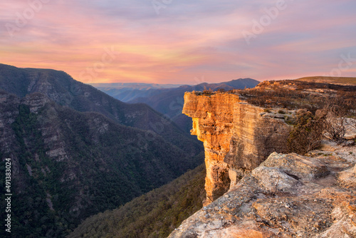 Magnificent cliff escarpment and deep valley views with sunset sky