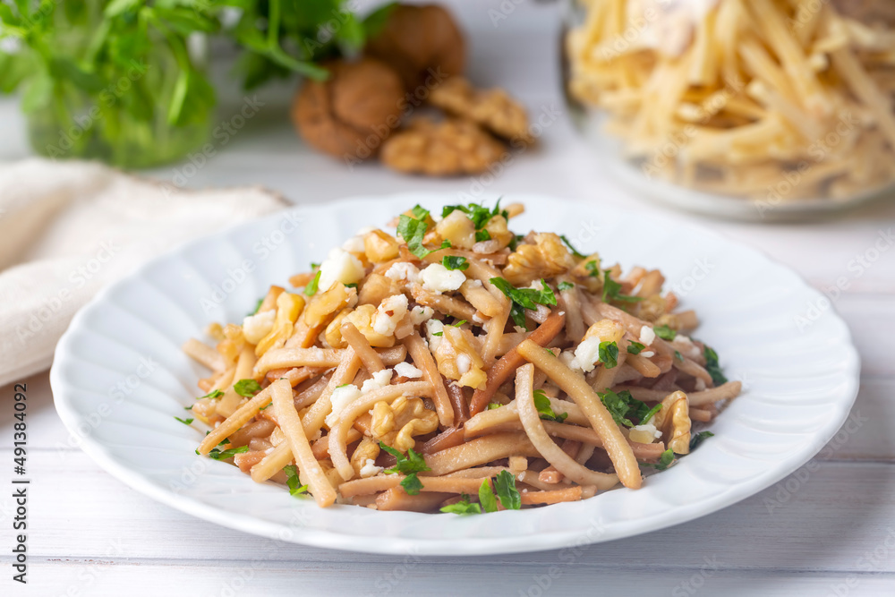 Turkish Noodle / Eriste with cheese, walnuts and parsley. Turkish Noodle / Eriste with cheese, walnuts and parsley.