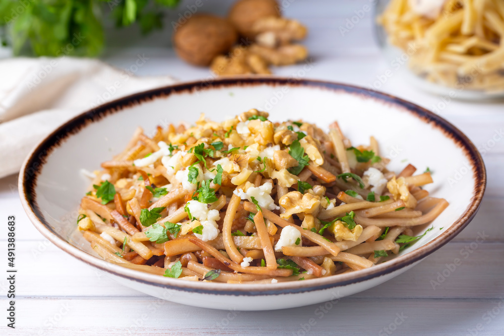 Turkish Noodle / Eriste with cheese, walnuts and parsley.