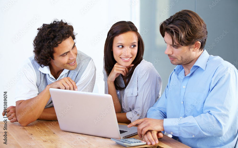 Teamwork to get the job done. A group of young entrepreneurs having a business meeting. Teamwork to get the job done. A group of young entrepreneurs having a business meeting.