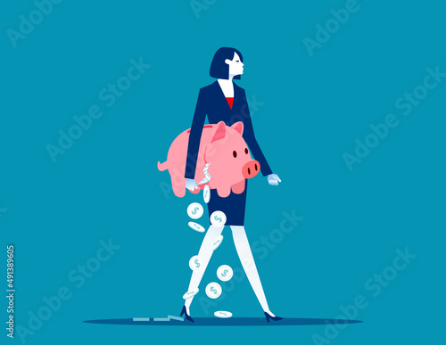 Businesswoman holding breaking apart piggy bank loosign savings. Business financial concept