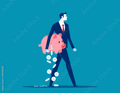 Businessman holding breaking apart piggy bank loosign savings. Business financial concept