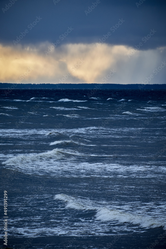 waves at the sea with stormy clouds waves at the sea with stormy clouds