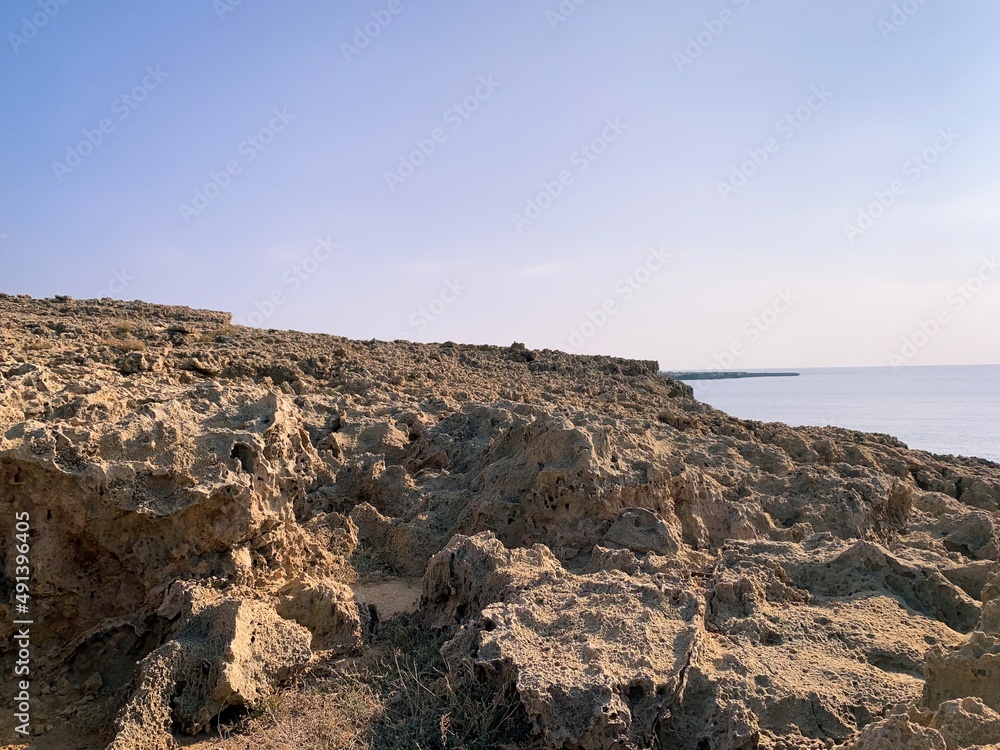 Obraz premium Rocky coast sea view, natural colors 
