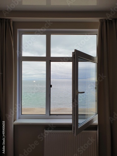 View on the calm peaceful sea outside the window Odessa Buy photo donate to UA army