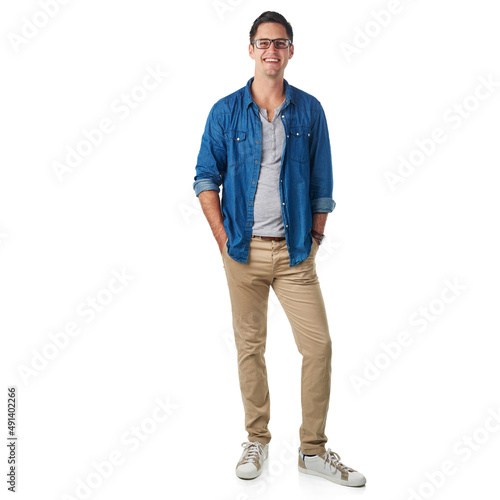 Hes cool and casual. Studio portrait of a handsome young man standing with his hands in his pockets isolated on white. photo