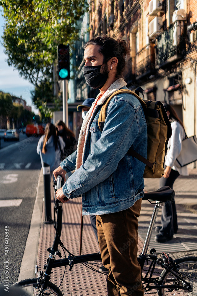 Man Using Bike in the City