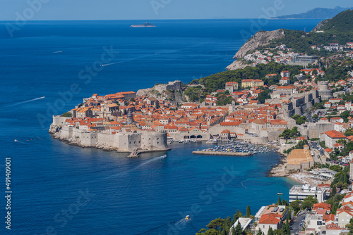 Fototapeta Naklejka Na Ścianę i Meble -  Aerial view of the old town Dubrovnik, blue sea and mountains, Croatia