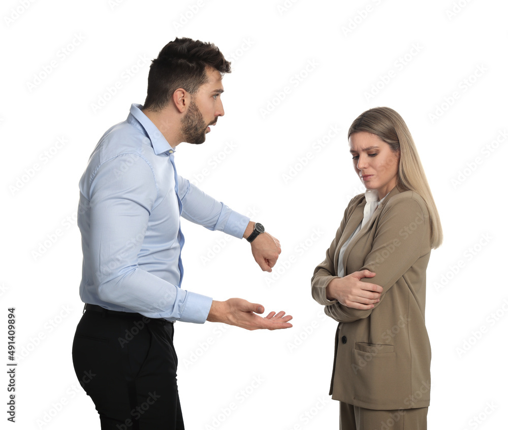 Businessman scolding employee for being late against white background Businessman scolding employee for being late against white background