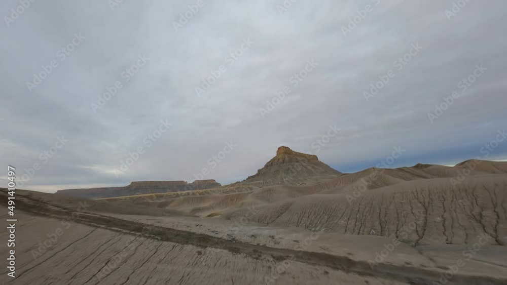 Factory Butte FPV Drone flyby in the hills and canyons. Factory Butte FPV Drone flyby in the hills and canyons.