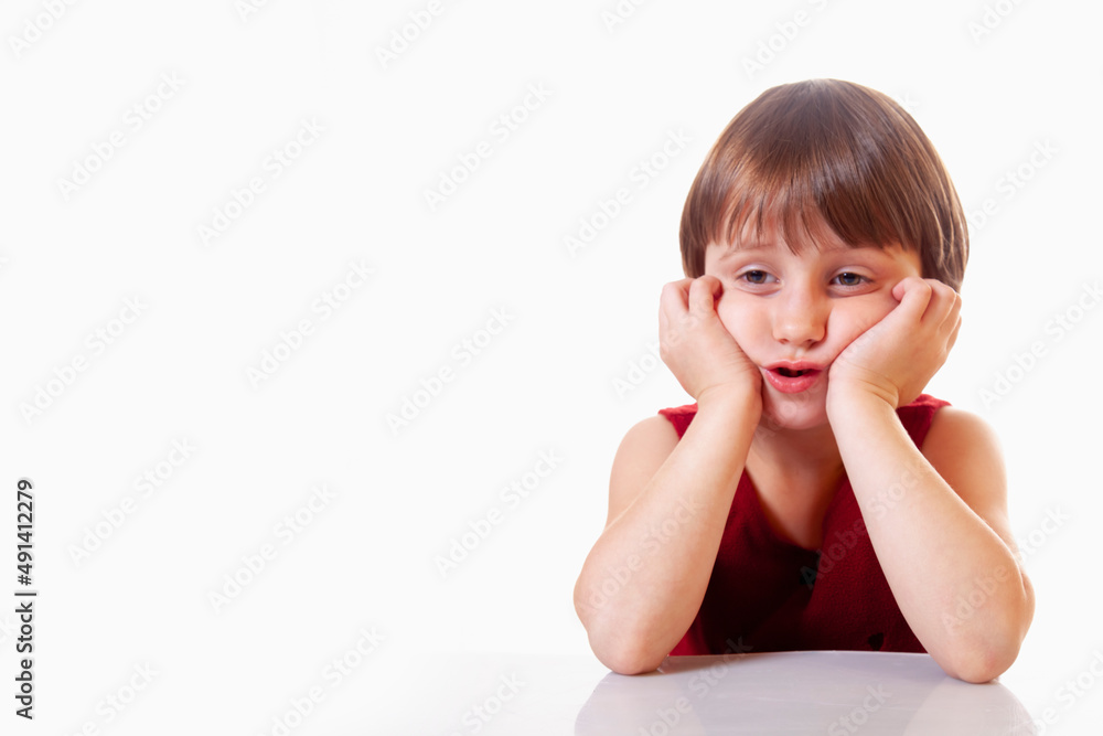 Portrait of confused and exhausted little cute child girl. Gestures, body language, facial expressions and depression concept. Free copy space. Portrait of confused and exhausted little cute child girl. Gestures, body language, facial expressions and depression concept. Free copy space.