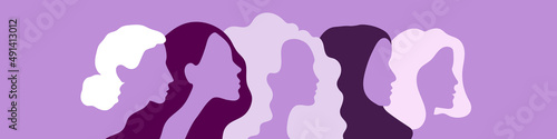 International Women's Day. March 8. Portraits of different women in profile. Horizontal format. Violet colors. Vector illustration, flat design photo