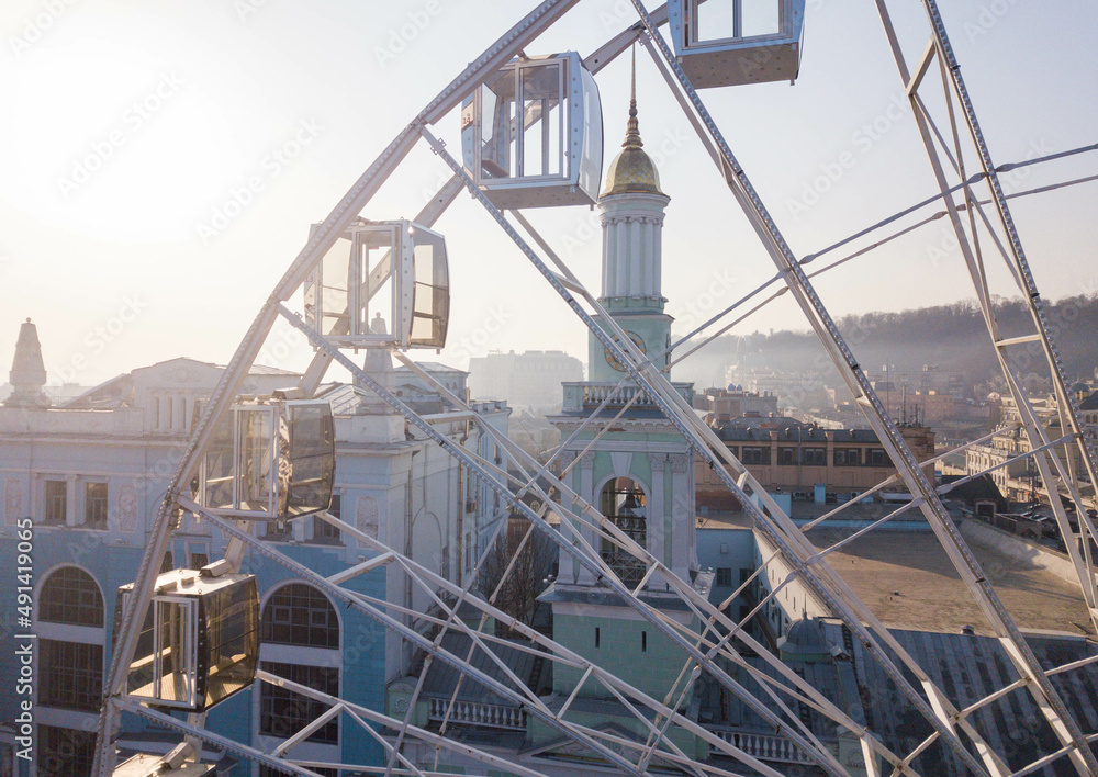 Top view of the ferris wheel at Kontraktova square and historic district Podil in Kyiv, Ukraine.
Touristic area. Aerial view of the complex of buildings of the former Greek monastery of St. Catherine. Top view of the ferris wheel at Kontraktova square and historic district Podil in Kyiv, Ukraine.
Touristic area. Aerial view of the complex of buildings of the former Greek monastery of St. Catherine.