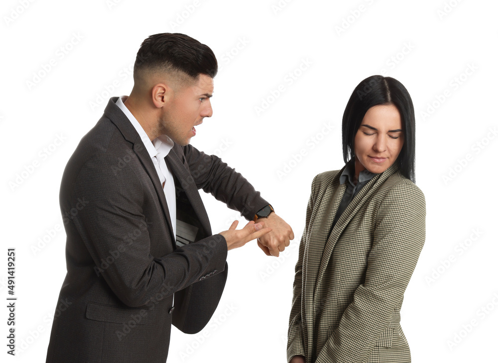 Businessman pointing on wrist watch while scolding employee for being late against white background Businessman pointing on wrist watch while scolding employee for being late against white background