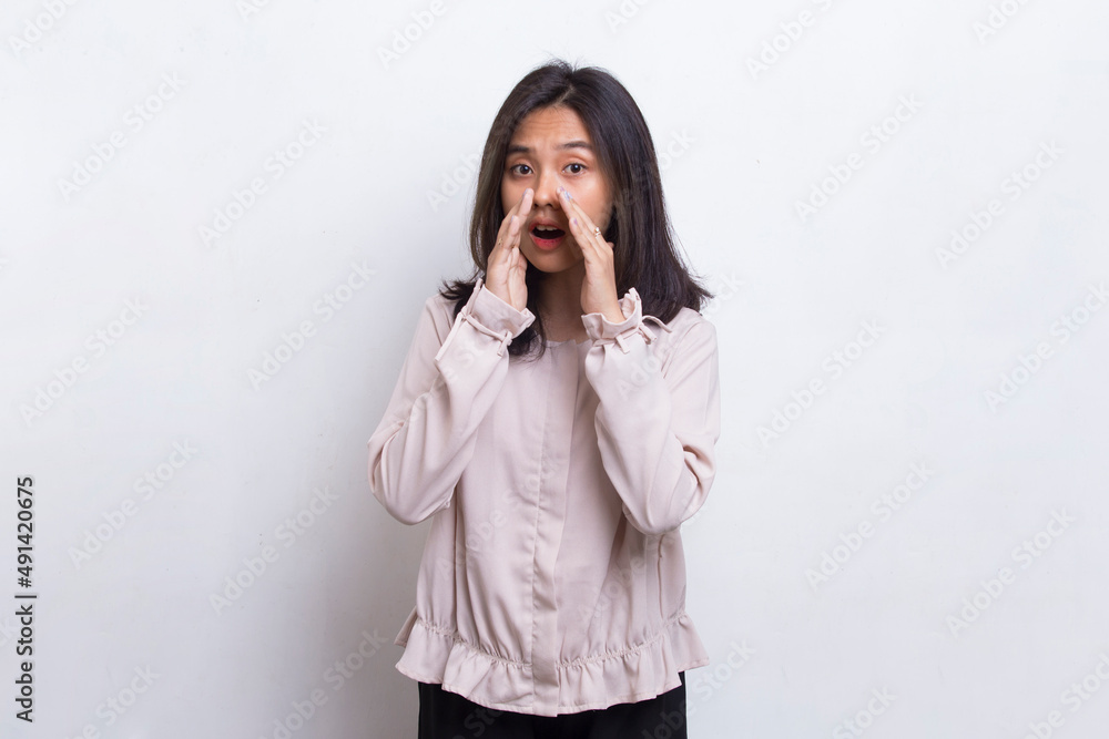 young asian beautiful woman shouting and yelling announcing isolated on white background
young asian beautiful woman shouting and yelling announcing isolated on white background