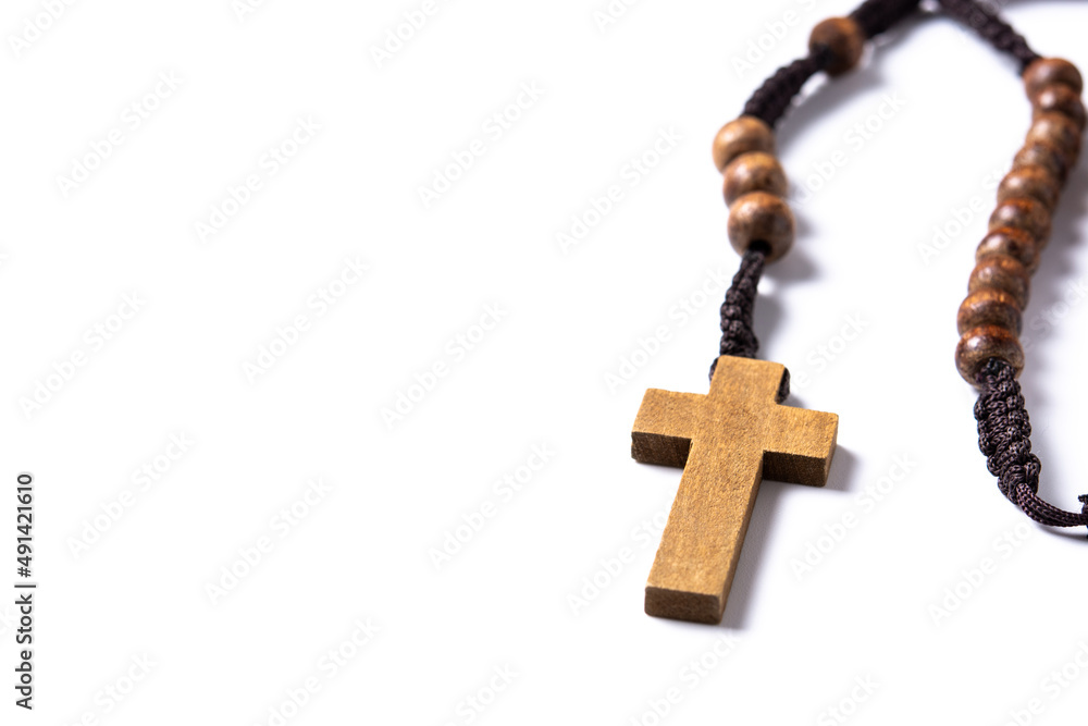 Rosary cathloic cross isolated on white background. Copy space