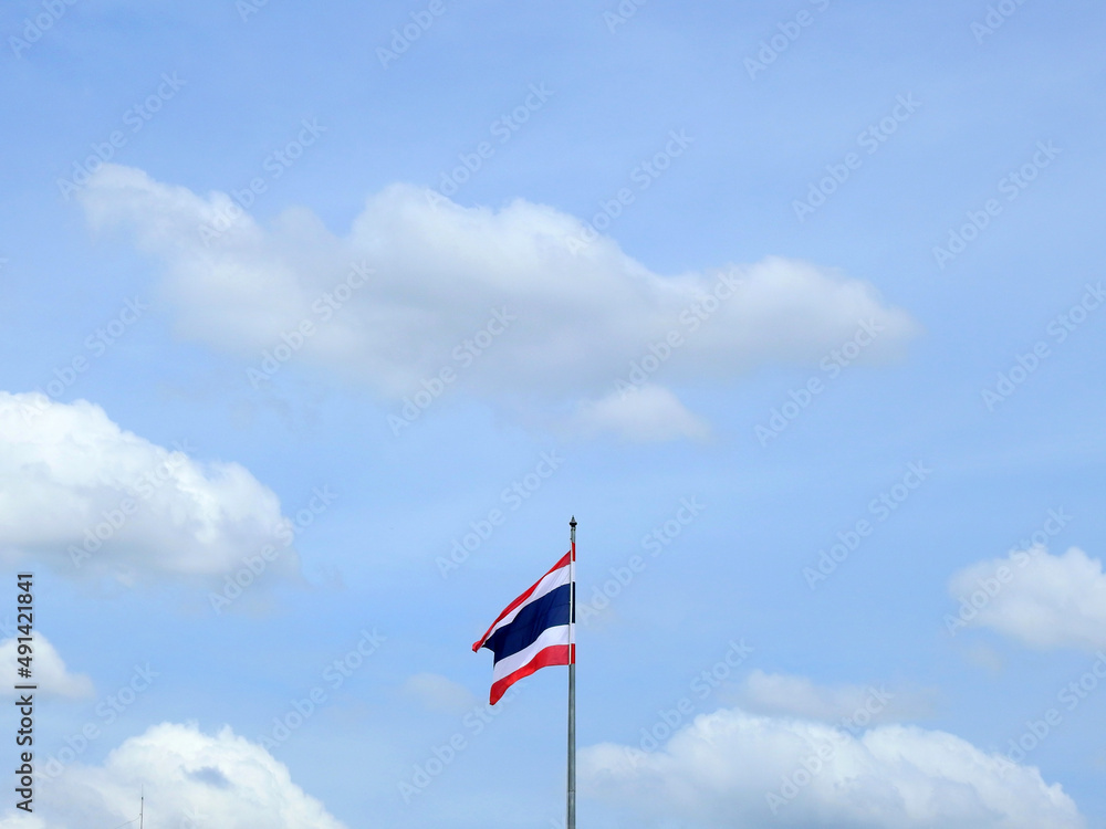 Thailand flag pole with cloud on blue sky background Thailand flag pole with cloud on blue sky background