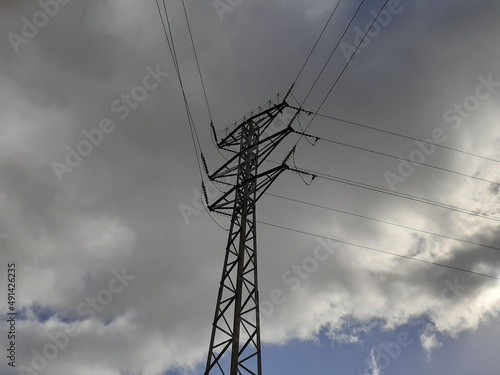 Power Line With A Cloudy Sky. Light consumption. Electricity