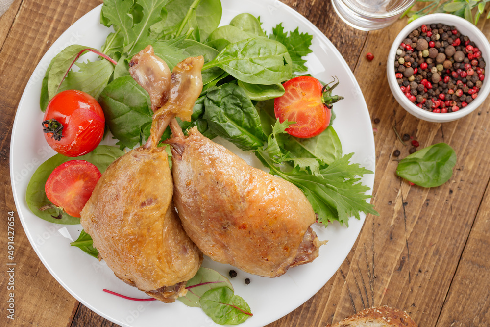 Duck/ chicken baked legs with vegetables Duck/ chicken baked legs with vegetables