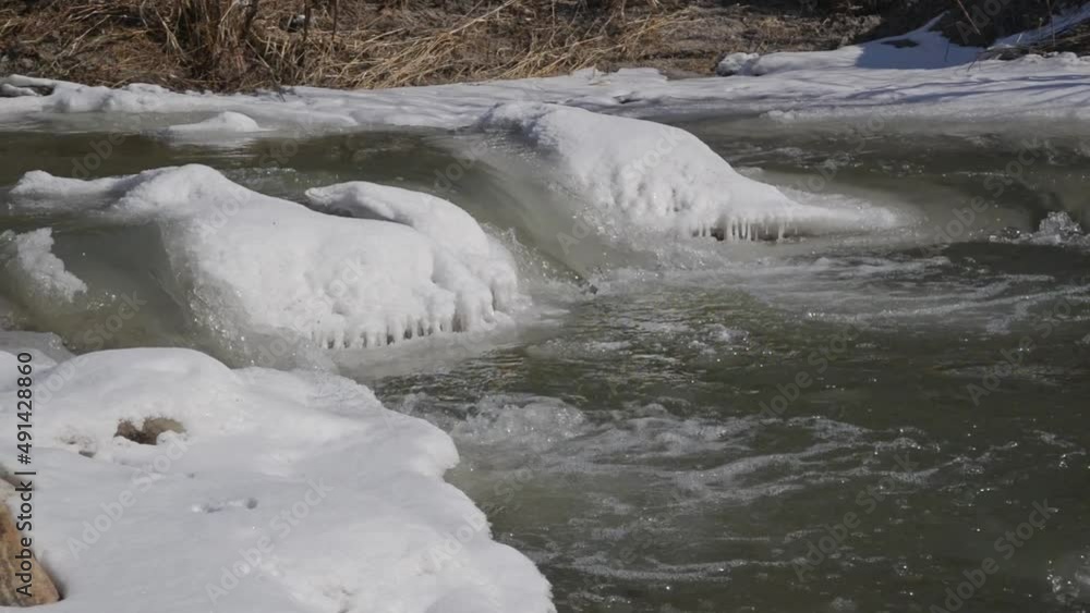 Winter Landscape. Partly frozen river in cold winter morning Winter Landscape. Partly frozen river in cold winter morning