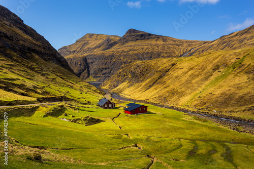 Mountain landscape in Osin Bay. Saksun, Faroe Islands. photo