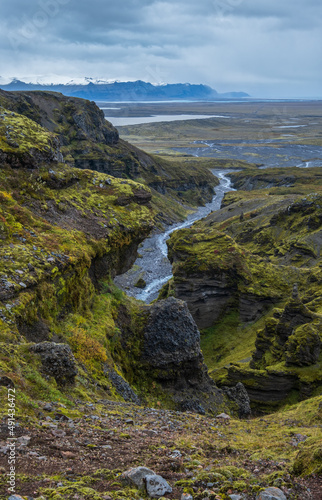 Beautiful autumn view from M  laglj  fur Canyon to Fjalls  rl  n glacier with Brei    rl  n ice lagoon  Iceland and Atlantic Ocean in far. It is south end of Vatnaj  kull icecap and   r  faj  kull volcano.