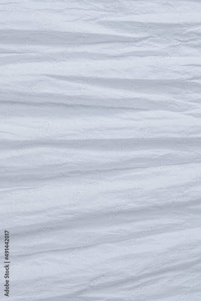 Obraz premium Crumpled white paper background.
