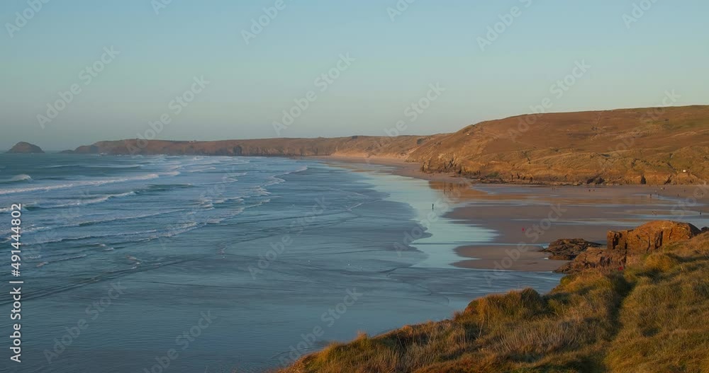 Perranporth Beach In Cornwall, England At Sunset - static shot Perranporth Beach In Cornwall, England At Sunset - static shot