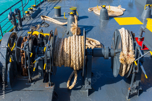 Ropes in steel wheel cages for anchorage on large tankers. © prasong.