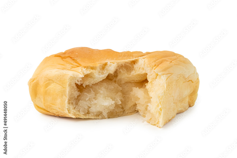 Freshly baked Coconut Soft and fluffy bread,Pieces of bun stuffed with sweet grated coconut on white background Freshly baked Coconut Soft and fluffy bread,Pieces of bun stuffed with sweet grated coconut on white background